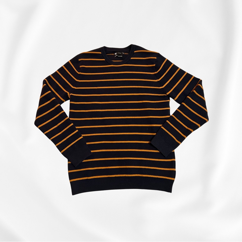 Navy blue sweater with orange stripes